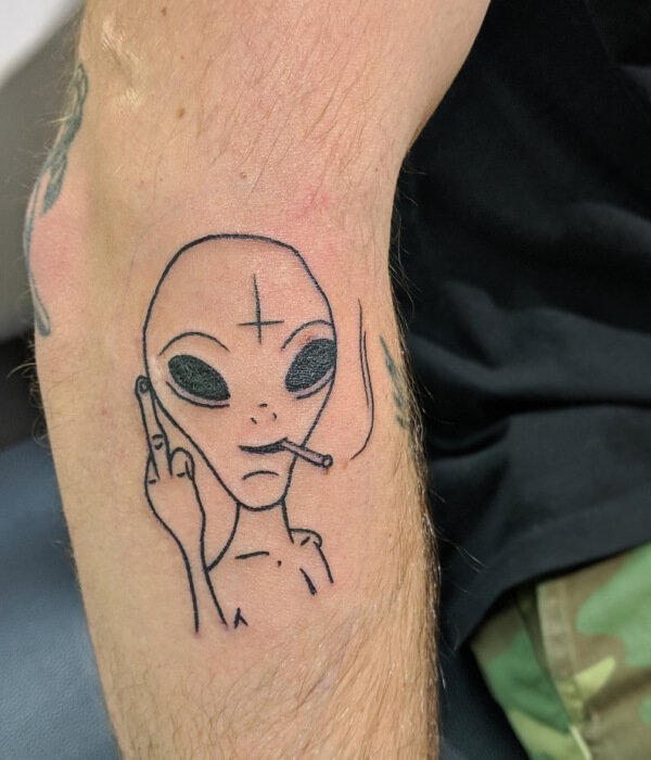 Alien smoking tattoo