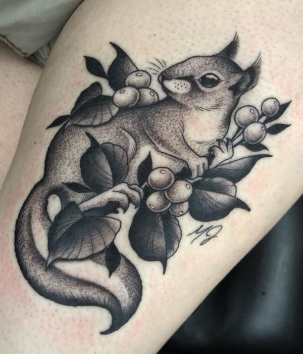 Bear with acorn plant tattoo