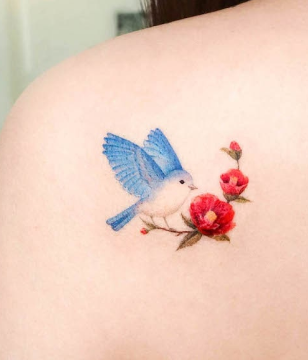 Bird with a plant tattoo