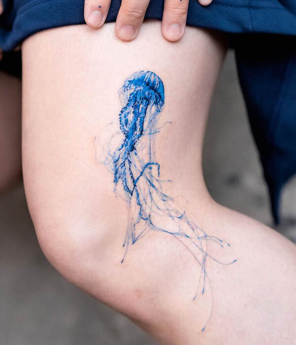 Blue jellyfish tattoo