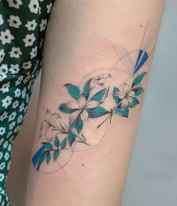 Entangled flowers and plants tattoo