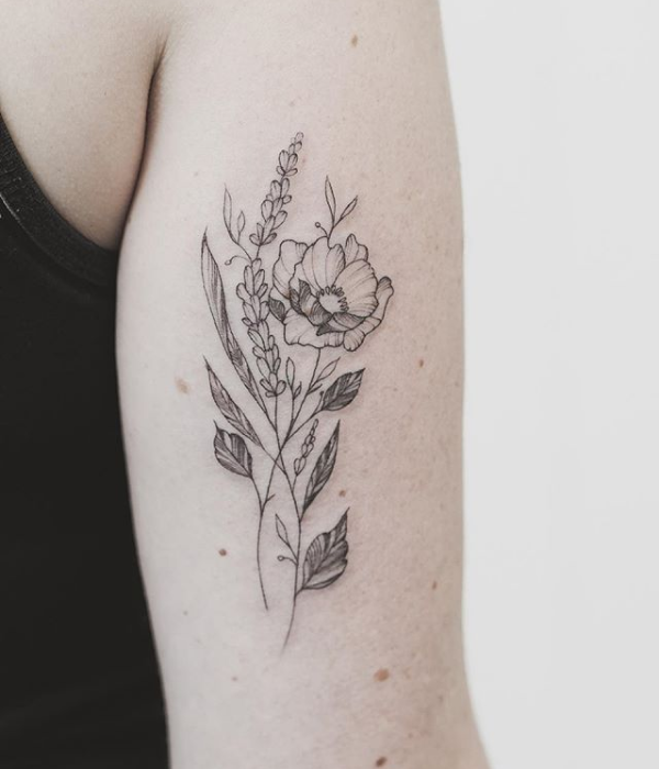 Entangled flowers and plants tattoo