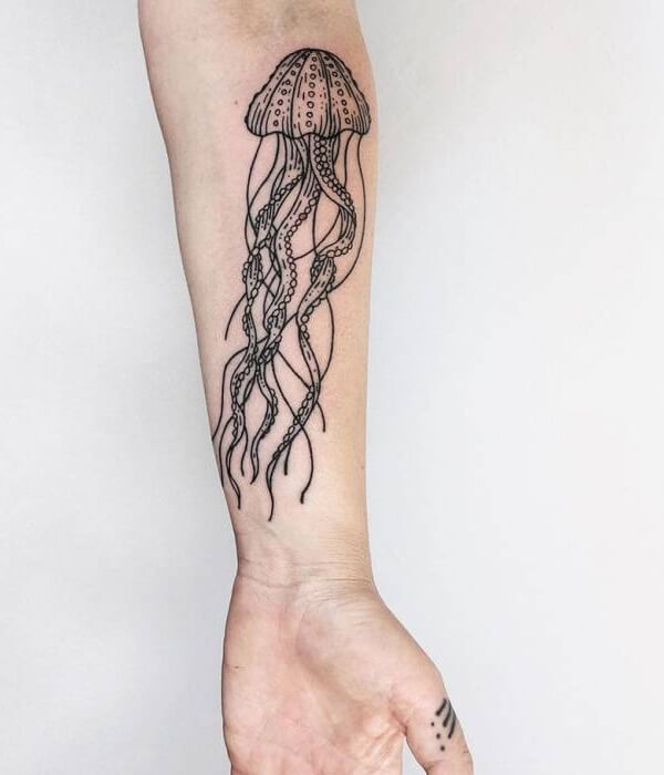 Forearm jellyfish tattoo