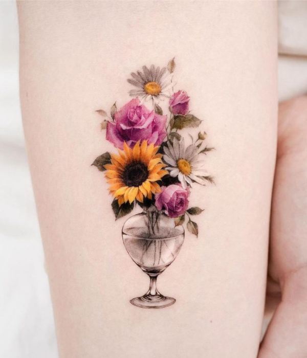 Plant in a vase tattoo
