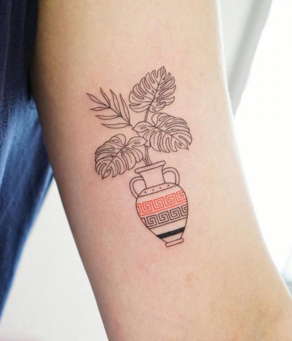 Plant in a vase tattoo