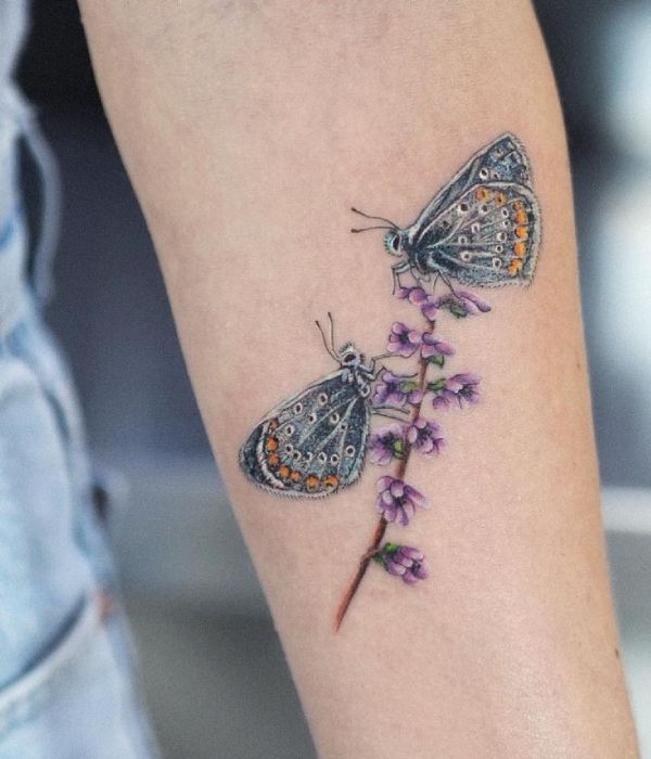Plant tattoo with butterfly