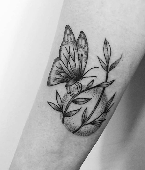 Plant tattoo with butterfly