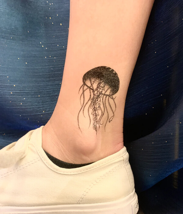 Small jellyfish tattoo