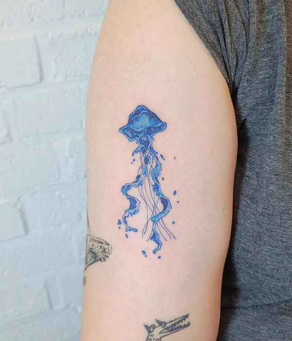 Small jellyfish tattoo
