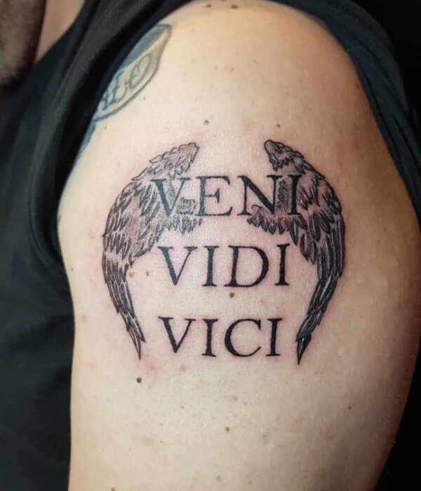 Veni Vidi Vici tattoo on the forearm