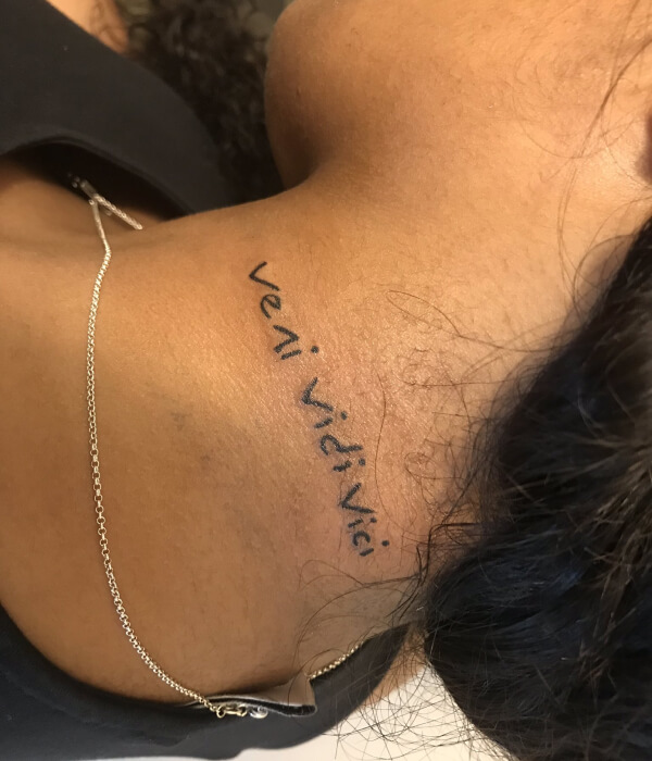 Veni Vidi Vici tattoo on the neck