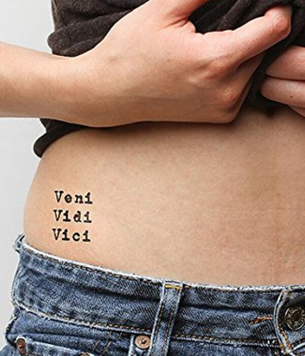 Veni Vidi Vici tattoo on the stomach