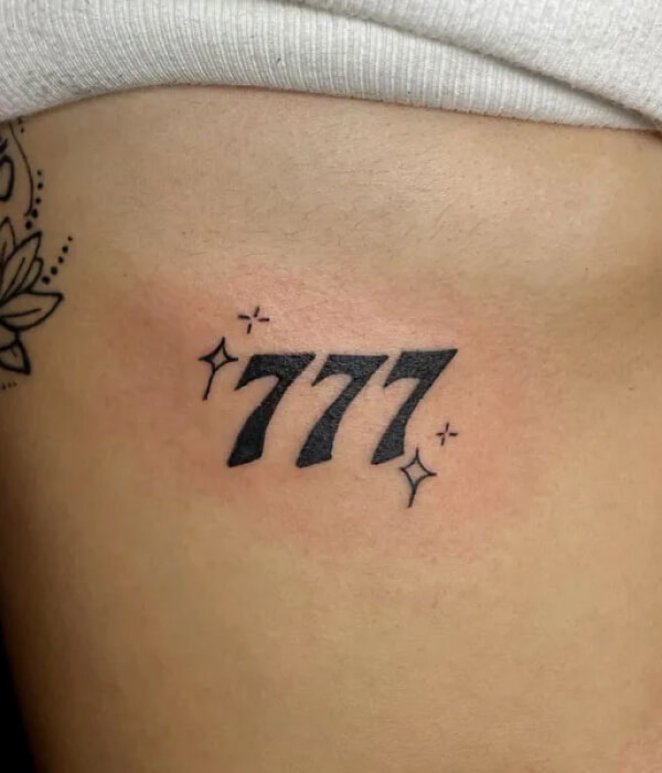 777 angel number tattoo