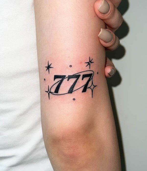 777 angel number tattoo