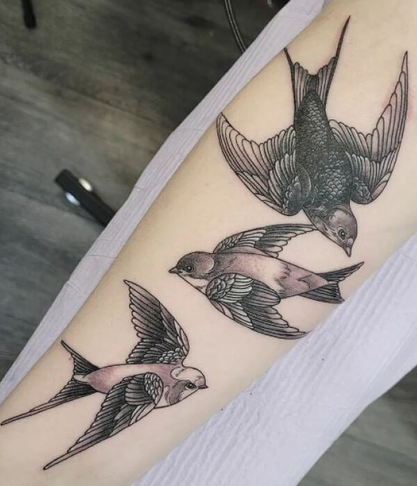 A sparrow in flight tattoo