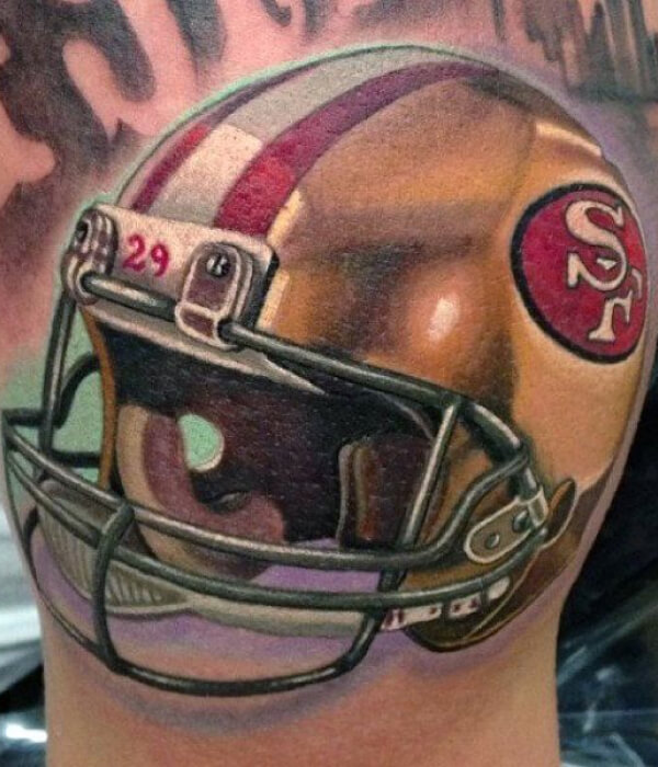 Amazing American football helmet tattoo
