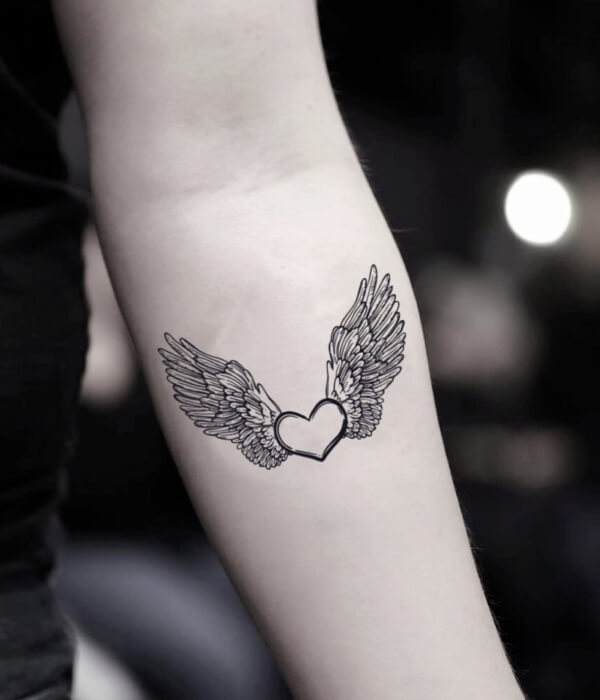 20 cutest wrist angel wings tattoo ideas with their meanings