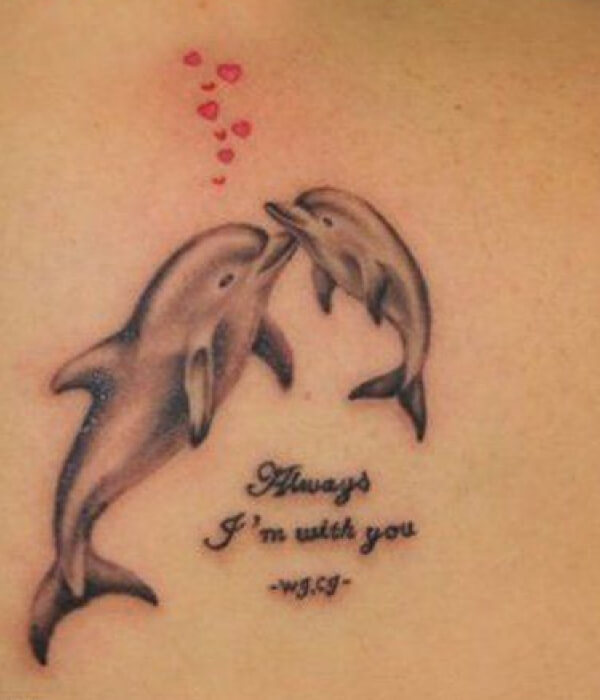 Baby and Father dolphin tattoo