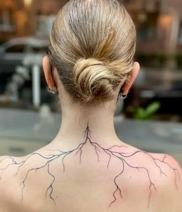 Back lightning tattoo