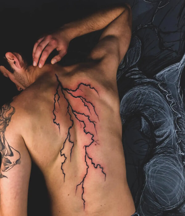 Back lightning tattoo