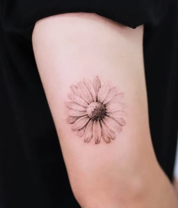 Black and grey daisy bouquet tattoo