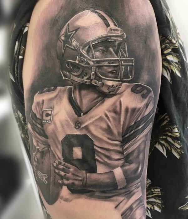 Black and white American football tattoo