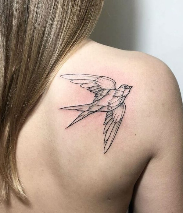 Black and white sparrow tattoo