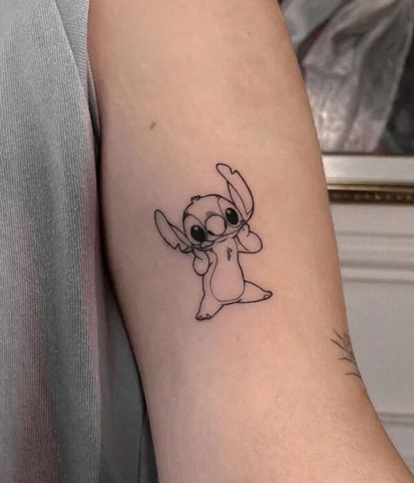 Black outline stitch tattoo