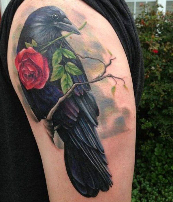 Black raven tattoo with rose