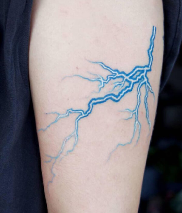 Blue lightning tattoo