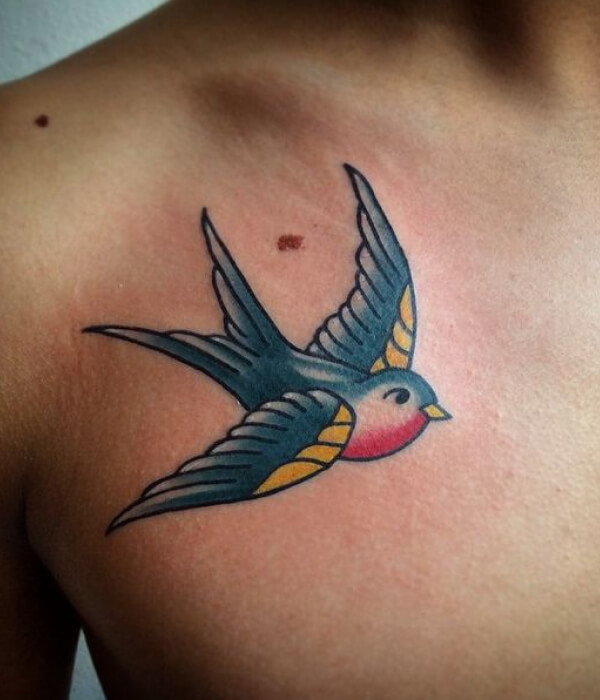Bright color swallow tattoo