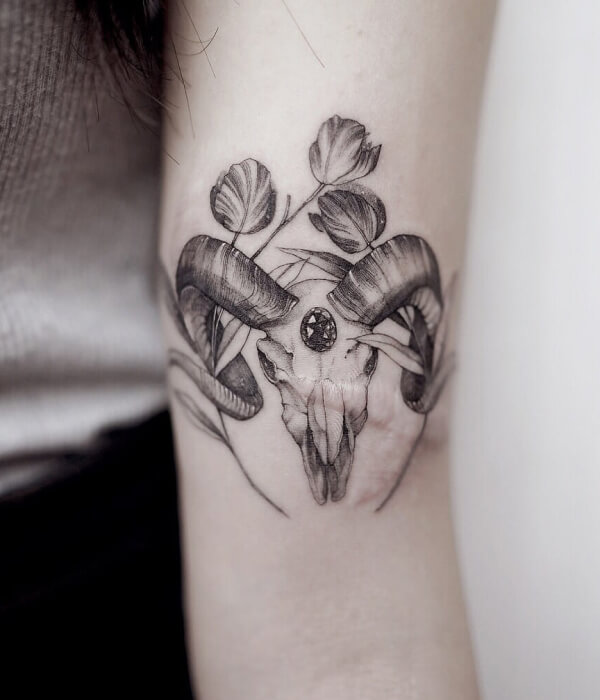 Bull skull uterus tattoo