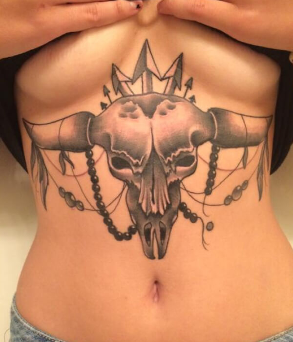 Bull skull uterus tattoo