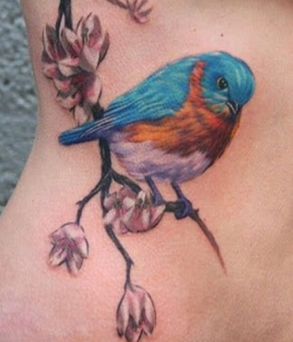Colorful sparrow tattoo