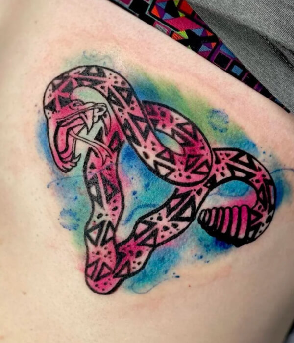 Colorful uterus tattoo