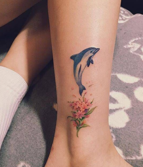 Dolphin tattoo designs with flowers