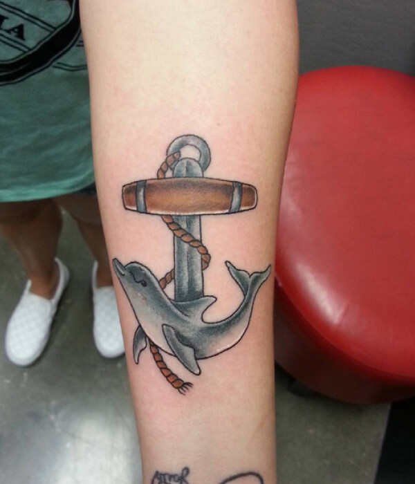 Dolphin tattoo with anchor