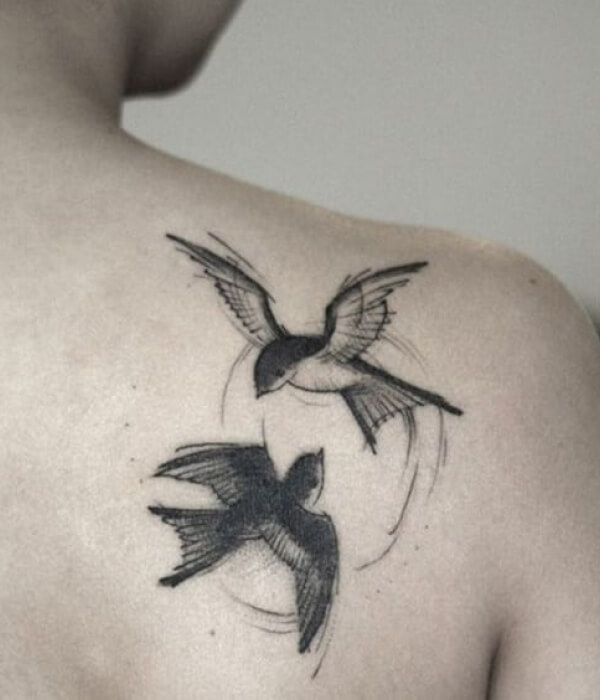 Dual swallow tattoo design