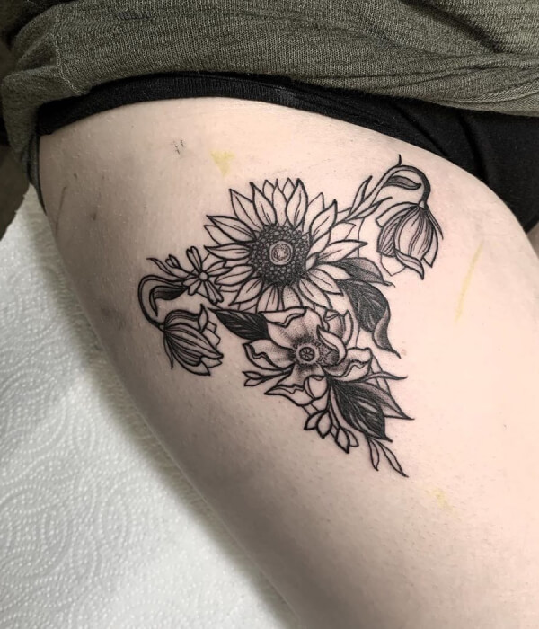 Floral womb tattoo