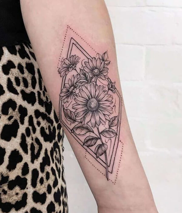 Geometric daisy tattoo