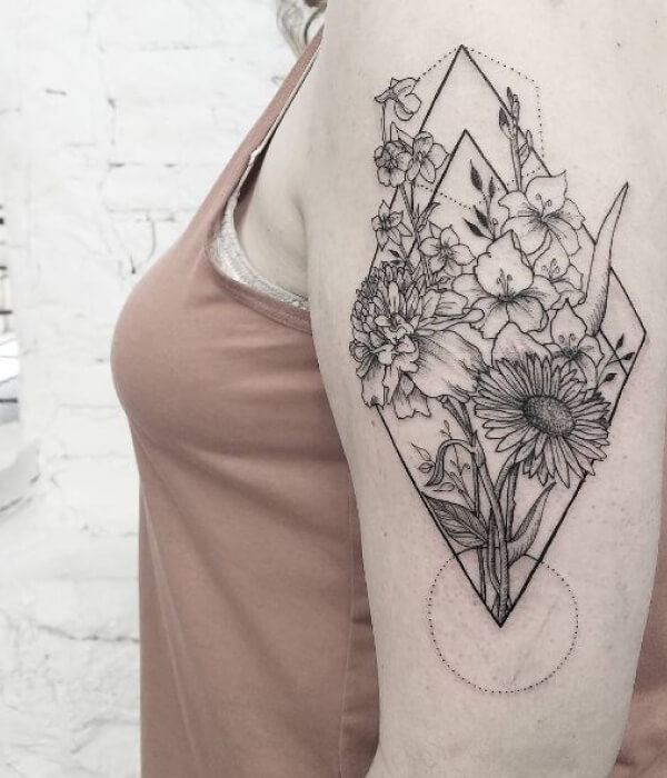 Geometric daisy tattoo