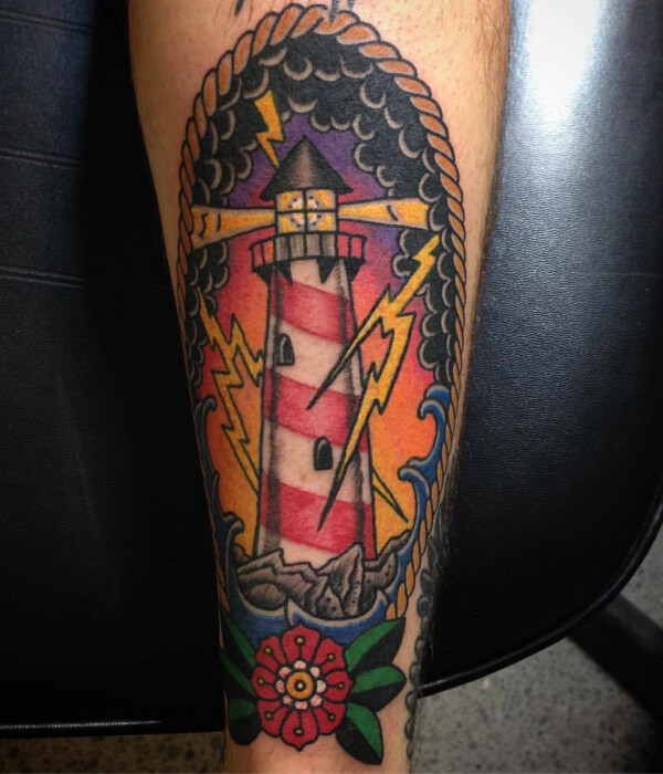 Lightning tattoo with lighthouse