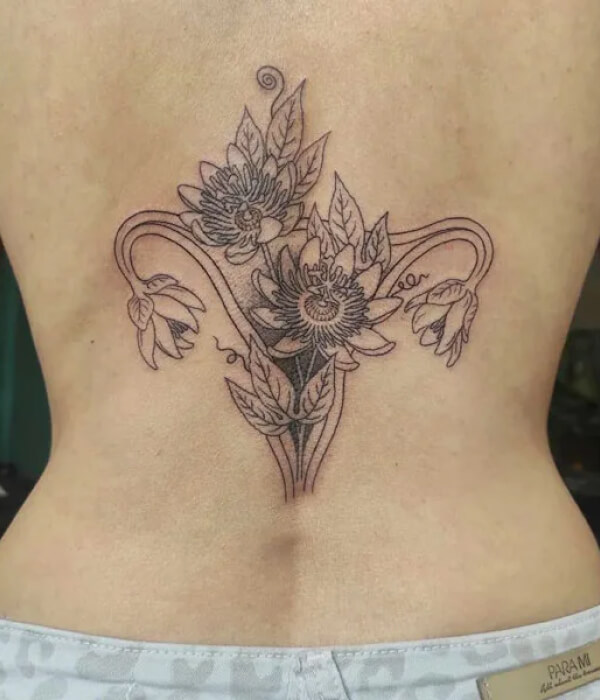 Lotus womb tattoo