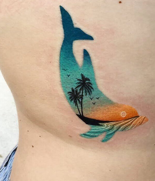 Map-themed dolphin tattoo