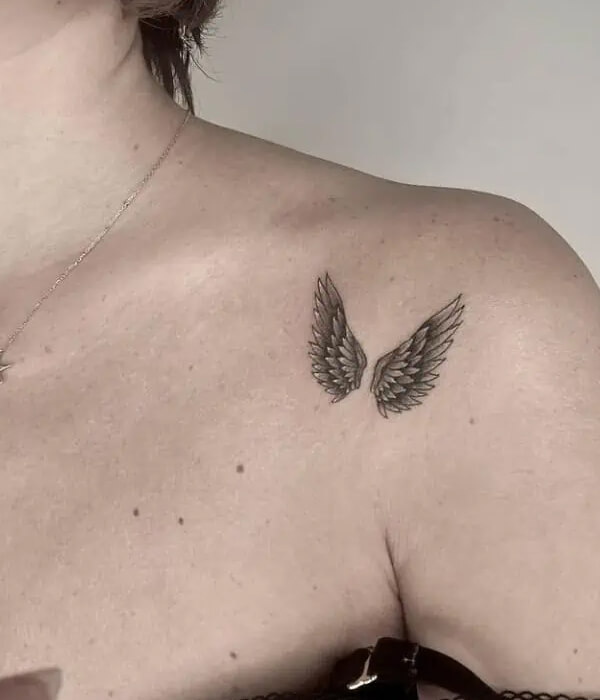 Minimal Wings Tattoo