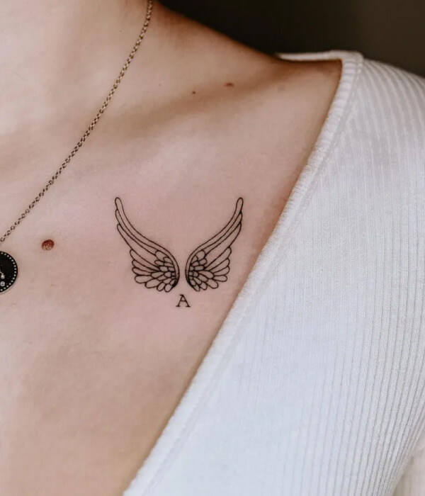 Minimal Wings Tattoo