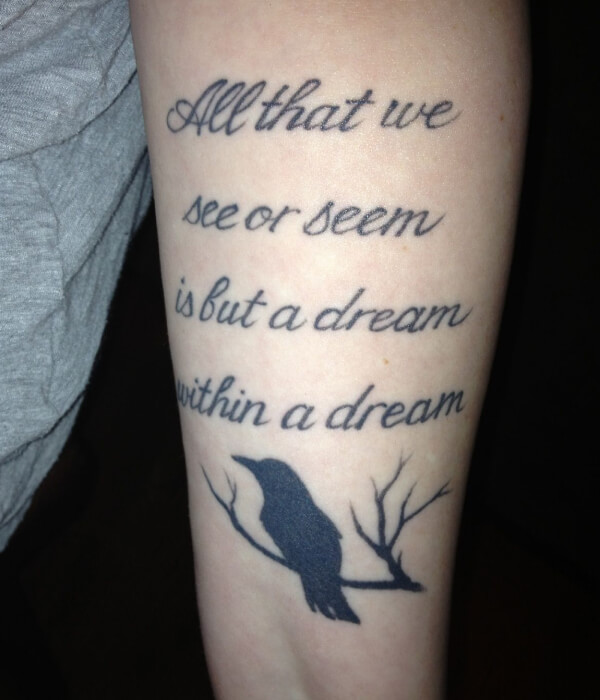 Raven tattoo with a quote