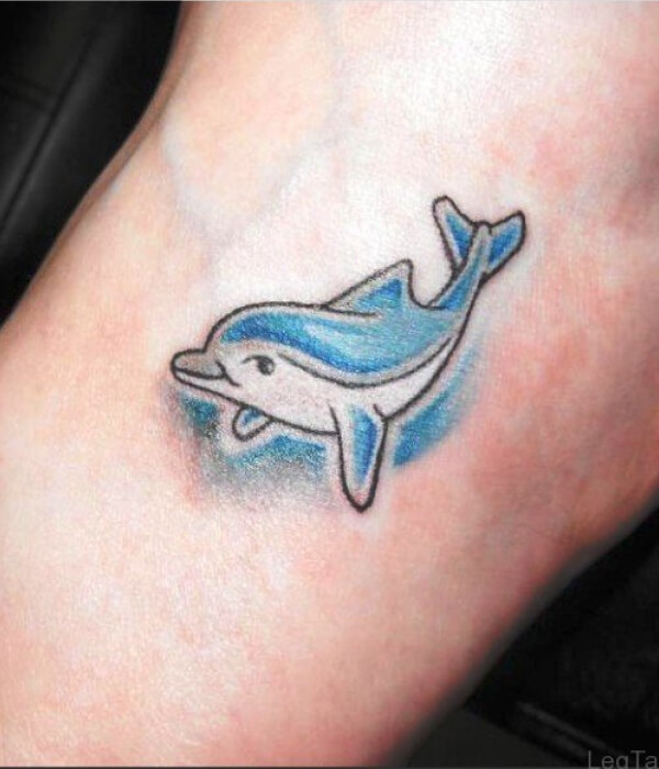 Simple blue dolphin tattoo
