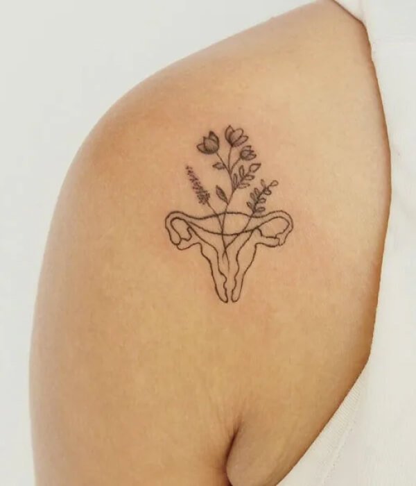 Simple womb tattoo