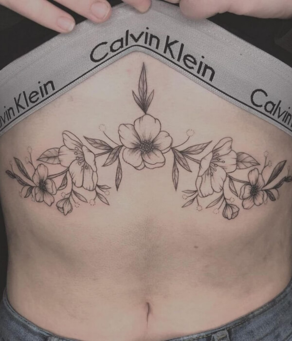 Sternum worm tattoo